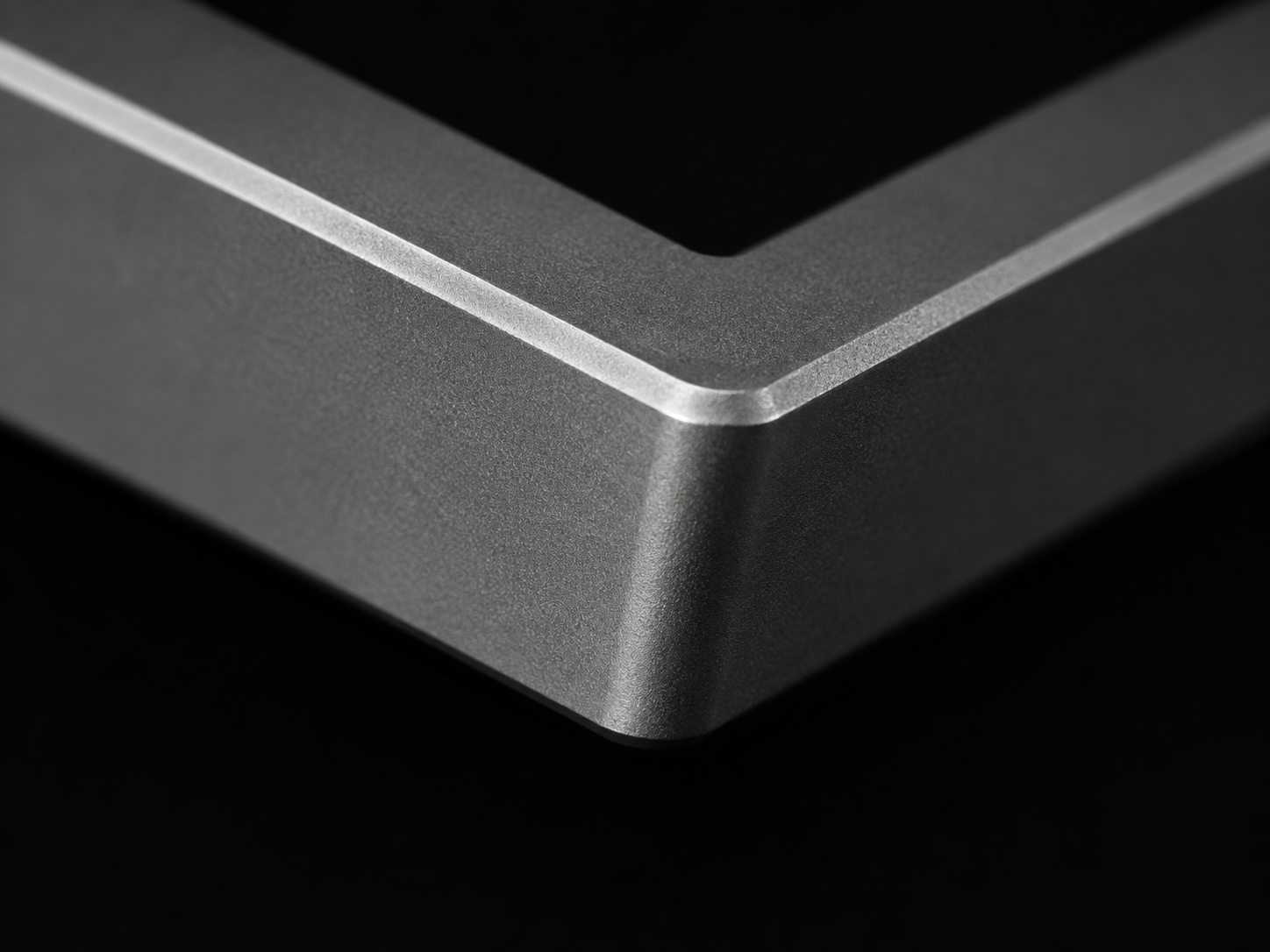 Corner detail of the C01's bead-blasted aluminum case